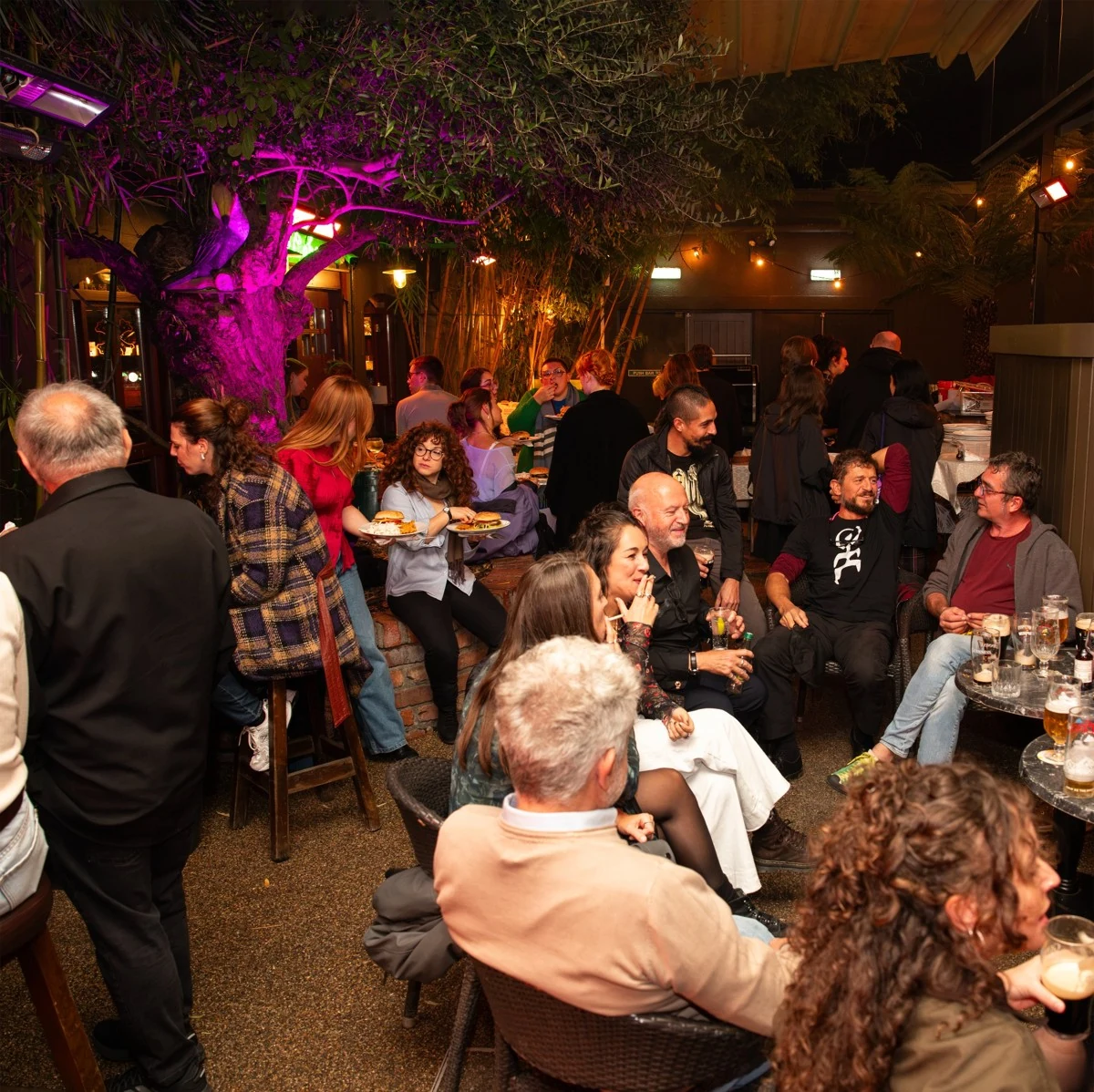 The Wexford Festival Opera company sharing an evening in the T. Morris beer garden.
